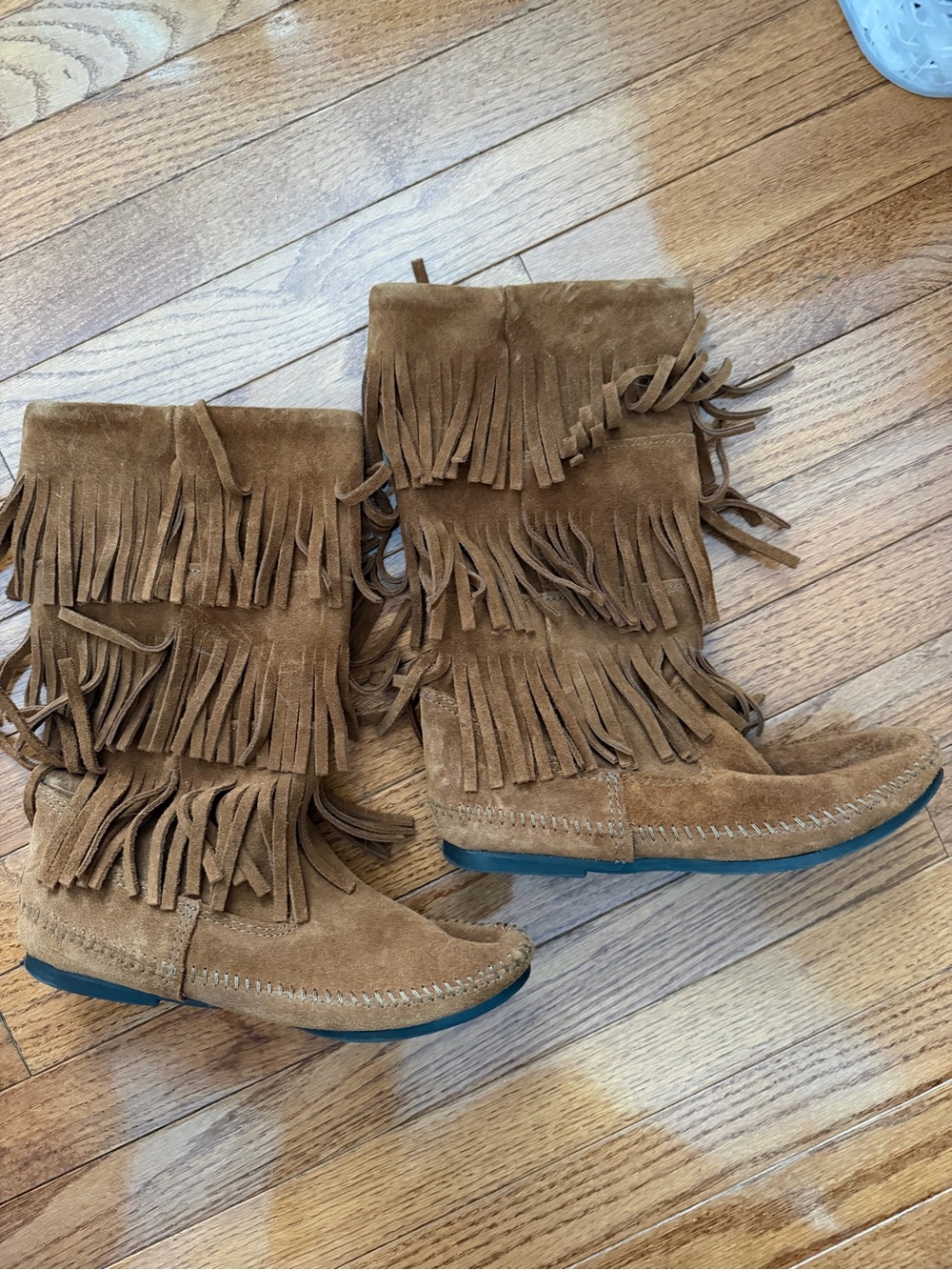 Never worn Minnetonka Fringed Suede Mid-Calf Boots in Brown